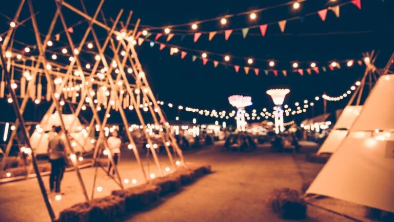 beautifully lit up event with festoon lights by night
